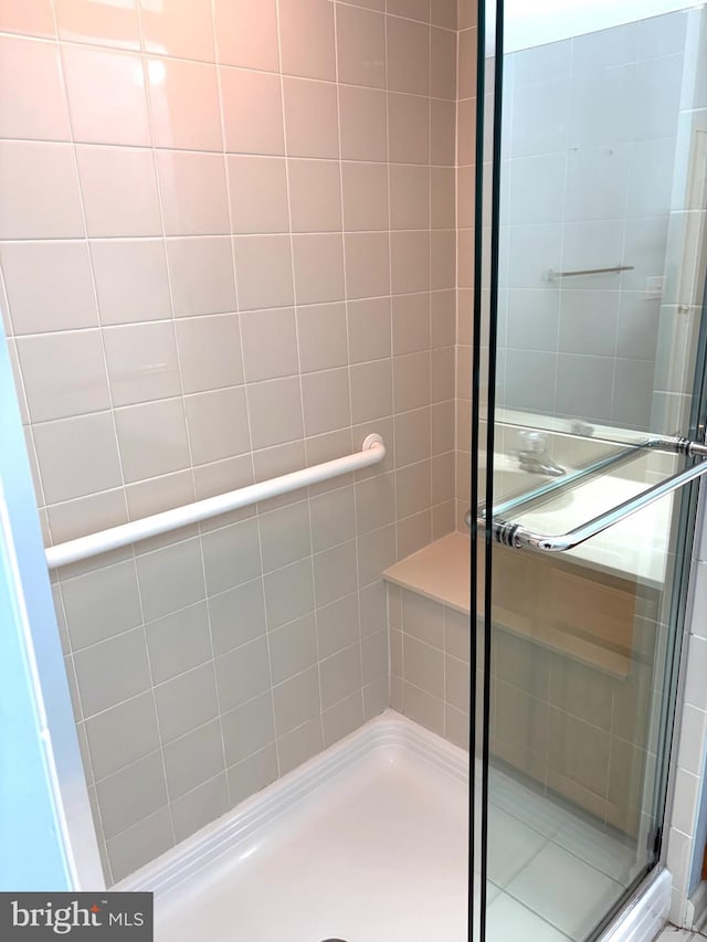 bathroom featuring walk in shower