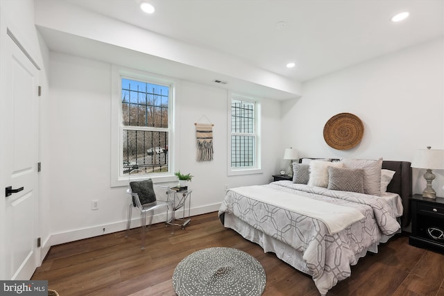 bedroom featuring dark wood-type flooring