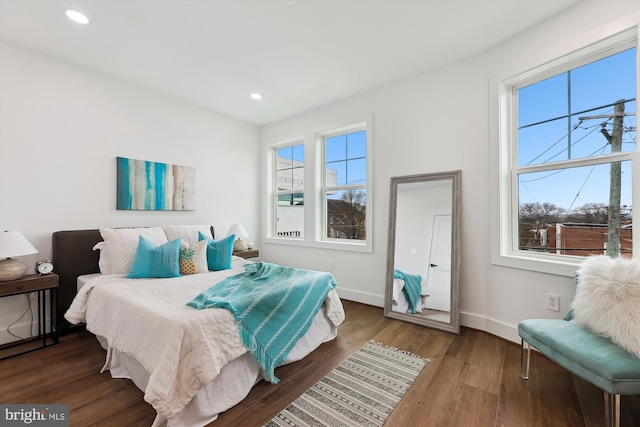 bedroom featuring dark hardwood / wood-style floors