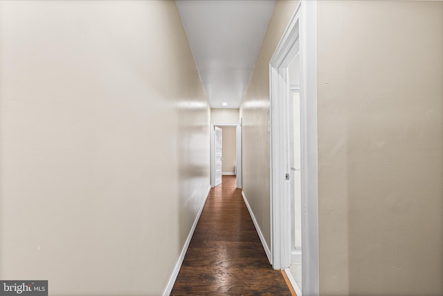 hall featuring dark wood-type flooring