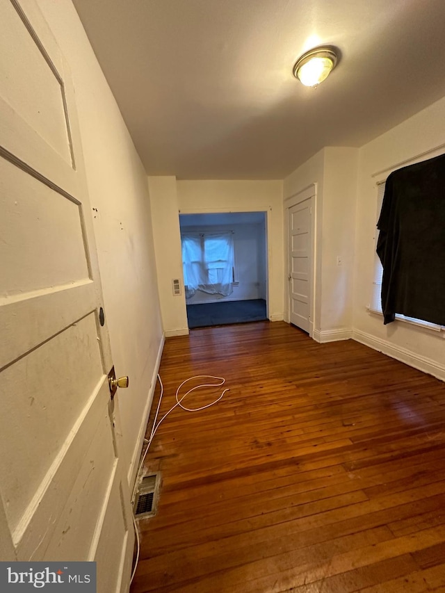 interior space featuring dark wood-type flooring