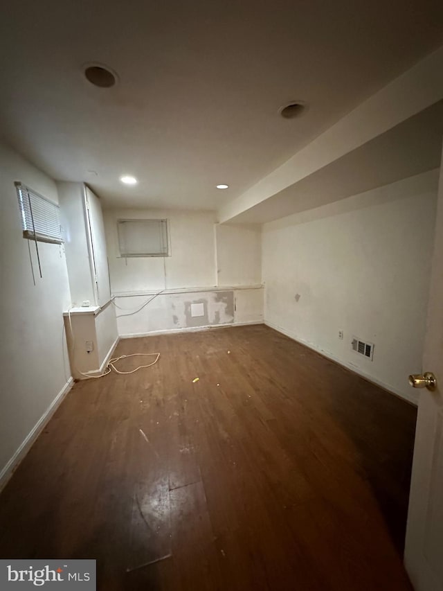 interior space with dark hardwood / wood-style floors