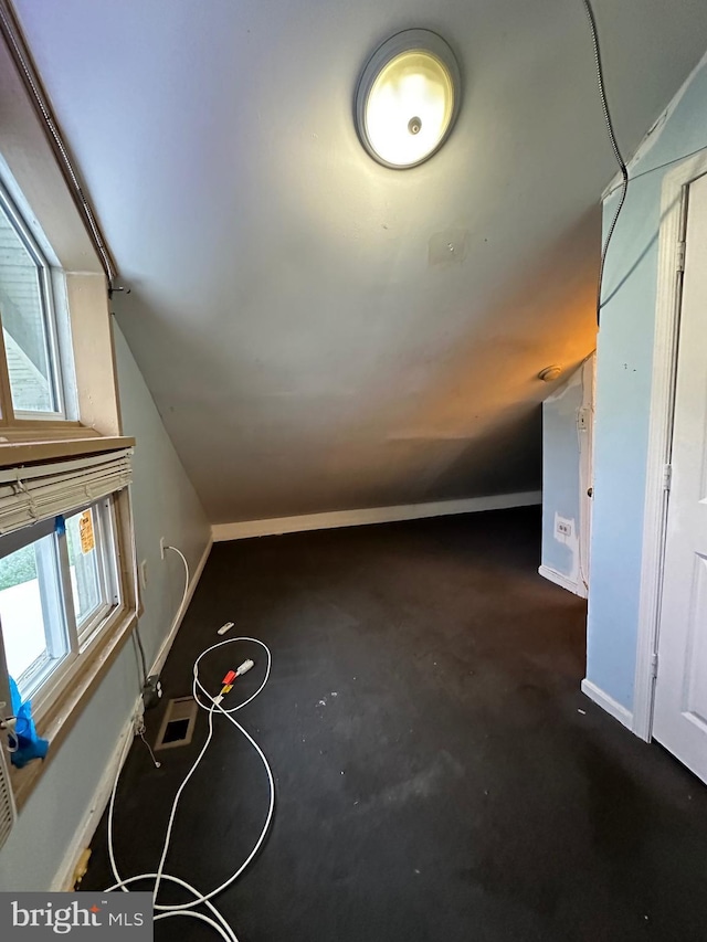 additional living space with lofted ceiling