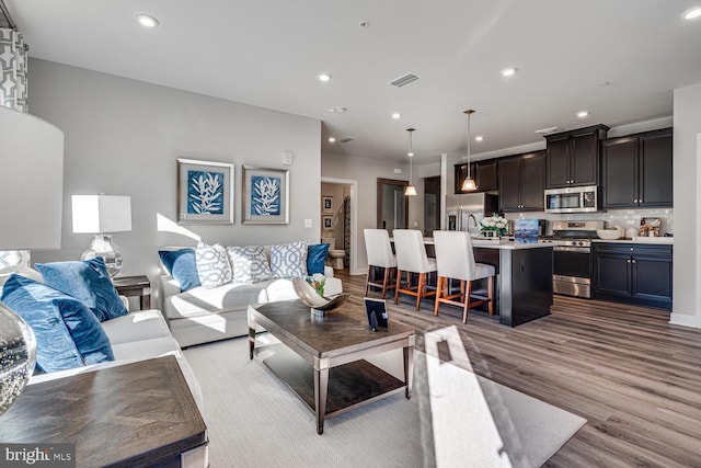 living room featuring light hardwood / wood-style flooring