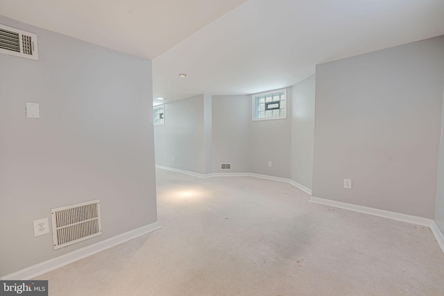 basement with light carpet