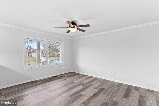 unfurnished room featuring ornamental molding, hardwood / wood-style floors, and ceiling fan