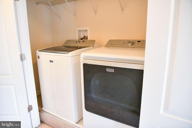 laundry room with washer and dryer