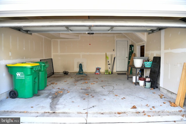 garage featuring a garage door opener