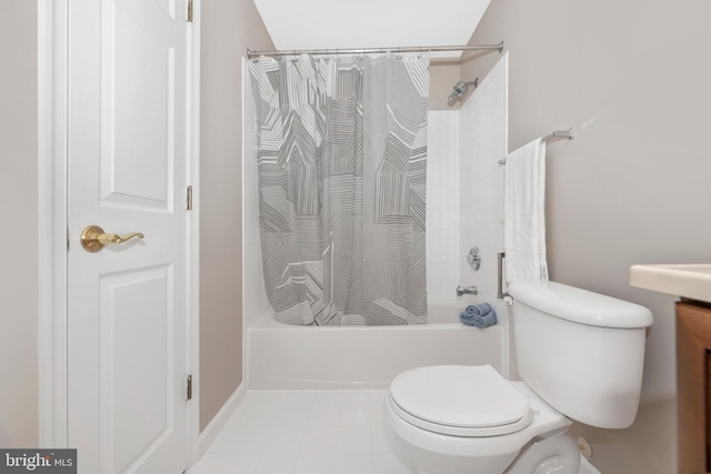 bathroom with shower / tub combo and toilet