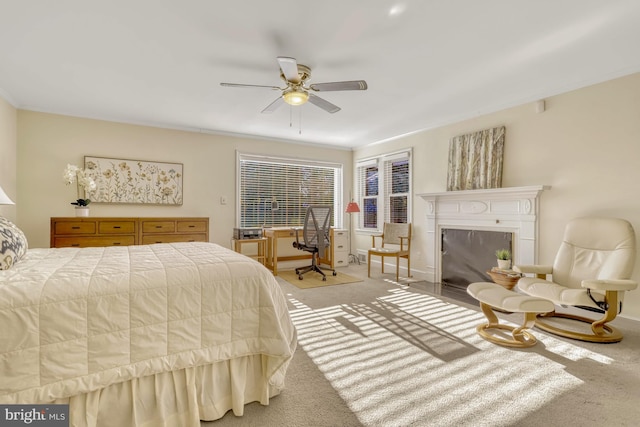 bedroom featuring ceiling fan, ornamental molding, and light carpet