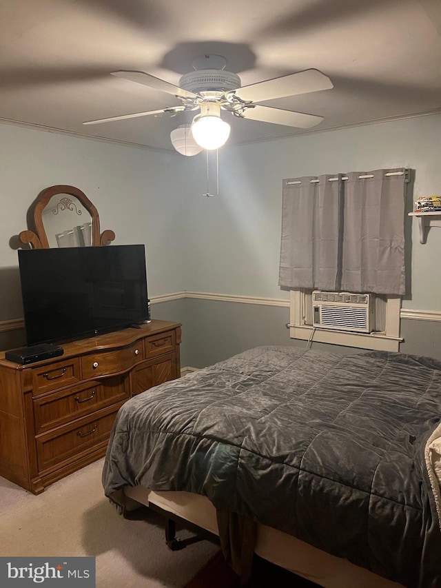 carpeted bedroom featuring ceiling fan and cooling unit