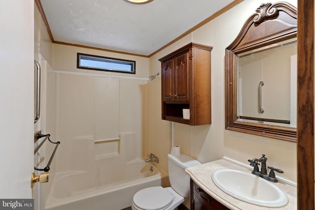 full bathroom featuring crown molding, vanity, bathtub / shower combination, and toilet