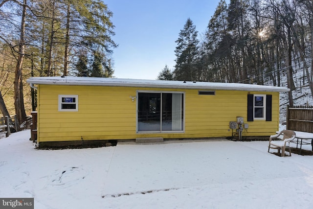 view of snow covered property