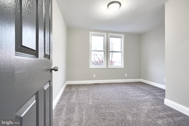 empty room featuring carpet