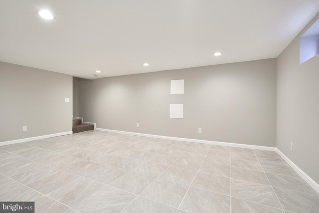 basement featuring light tile patterned floors