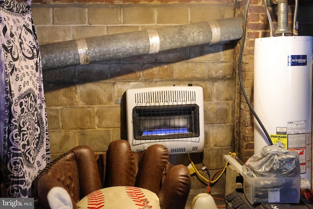 interior space with gas water heater and heating unit