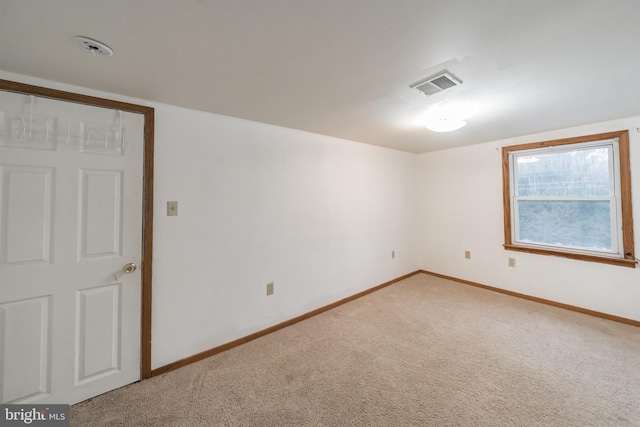 unfurnished room featuring carpet floors