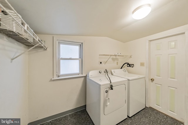 washroom featuring washer and clothes dryer