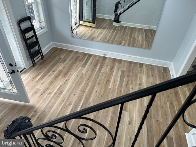 interior space with hardwood / wood-style floors and a wealth of natural light