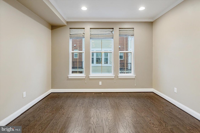 unfurnished room featuring hardwood / wood-style floors