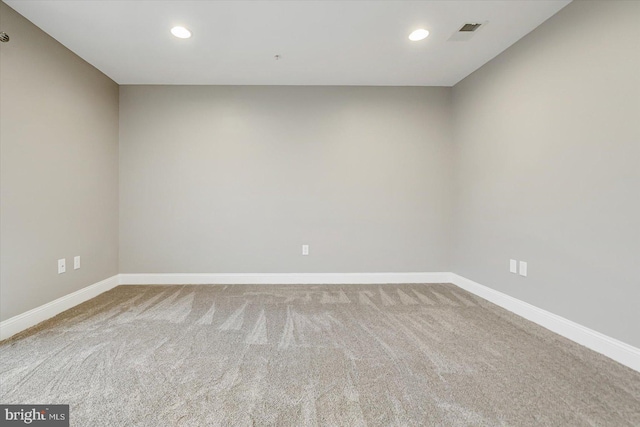 view of carpeted spare room