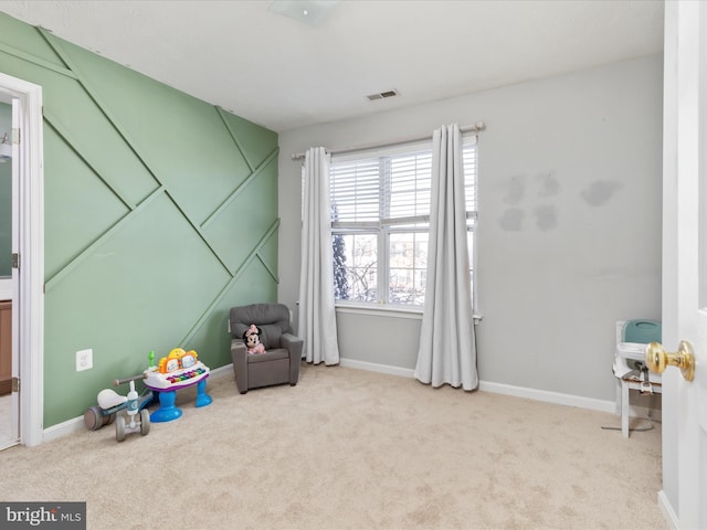 playroom with light colored carpet