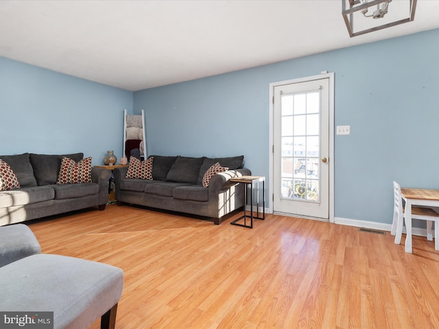 living room with light wood-type flooring