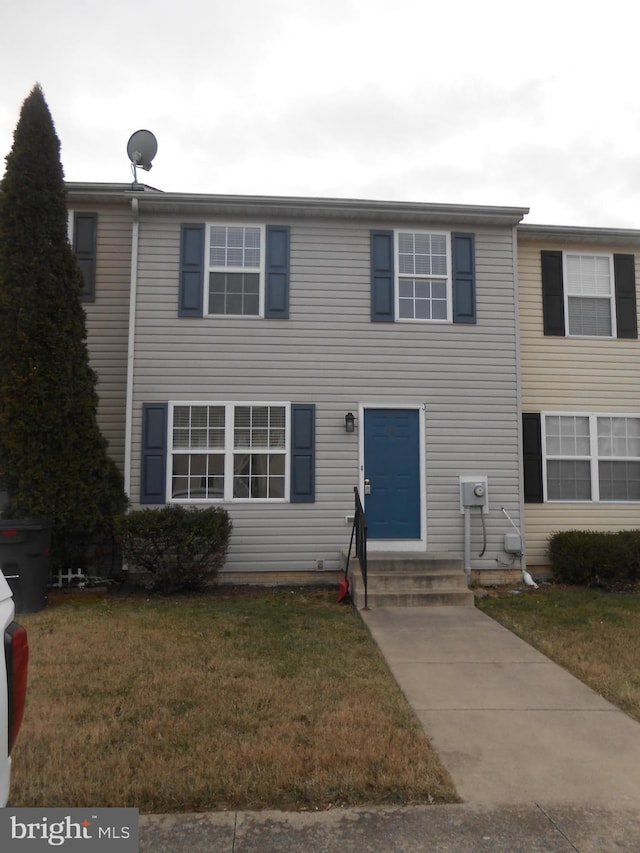 view of front of home with a front yard