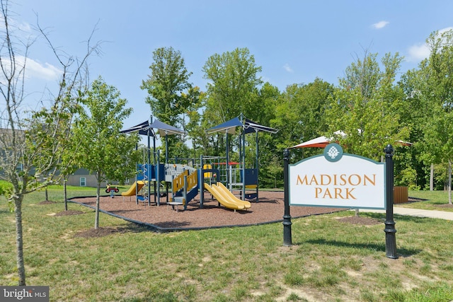 view of play area featuring a lawn