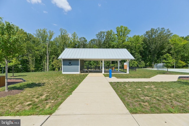 view of community with a yard