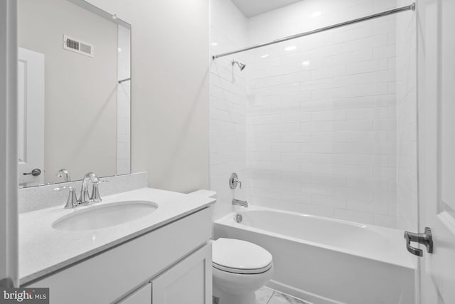 full bathroom with washtub / shower combination, vanity, and toilet