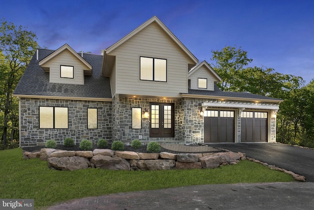 437 Mountainwoods Dr, Lake Harmony, PA 18624 - view of front facade featuring french doors and a garage