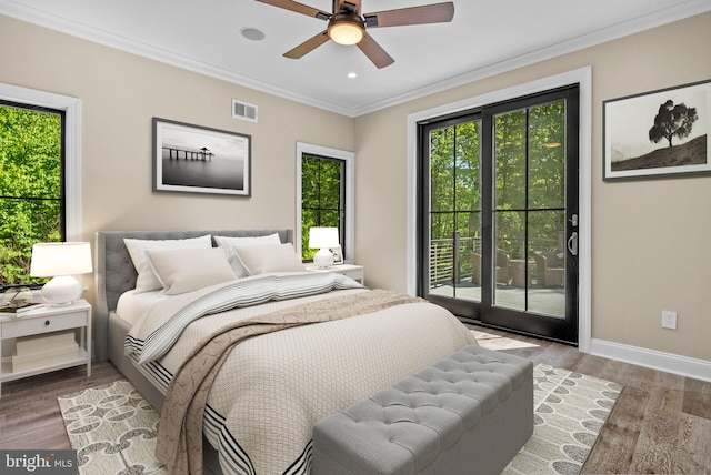 bedroom with wood-type flooring, access to outside, ceiling fan, and crown molding