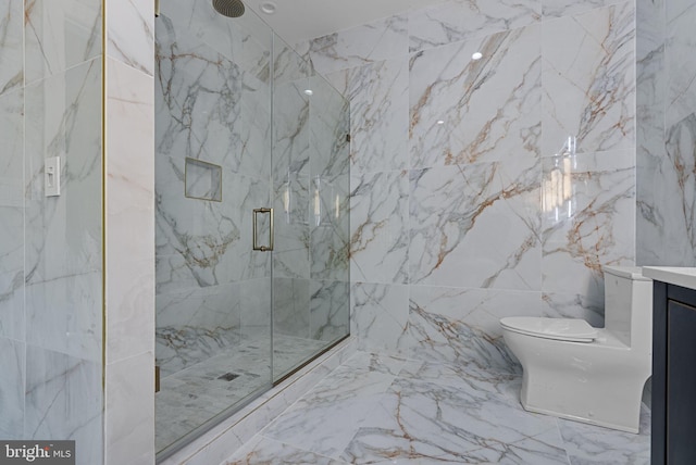 bathroom featuring vanity, toilet, and an enclosed shower