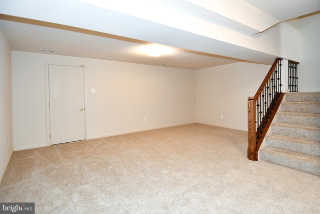 basement with carpet floors