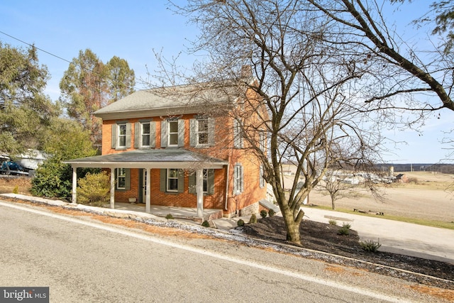 view of front of house featuring covered porch