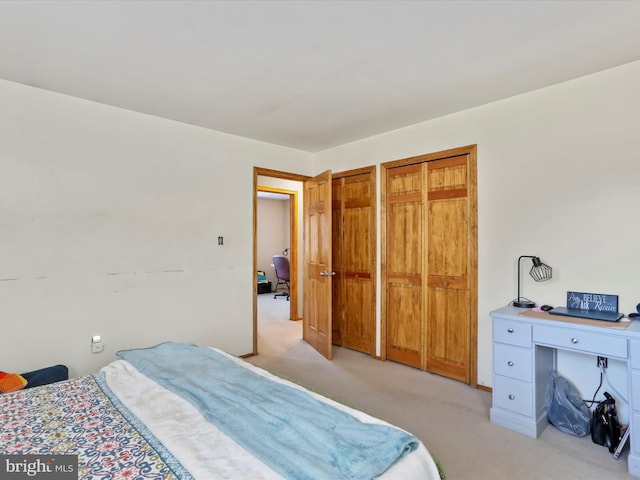 bedroom with light carpet