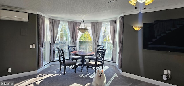 dining room featuring a wall mounted AC, crown molding, carpet floors, and a textured ceiling