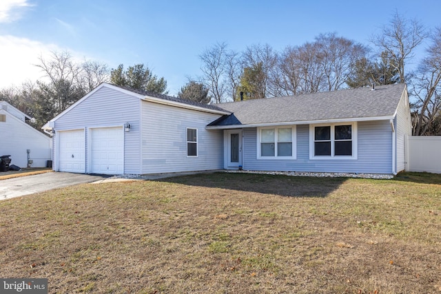 single story home featuring a front yard and a garage