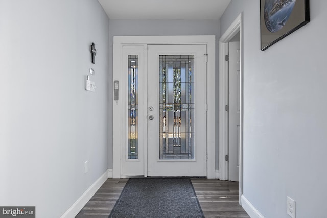 doorway featuring dark hardwood / wood-style flooring