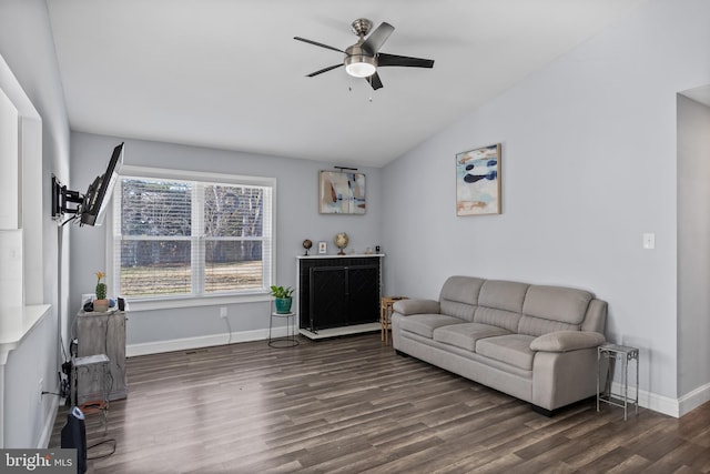 living room featuring ceiling fan, dark hardwood / wood-style floors, and lofted ceiling