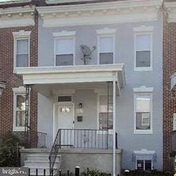 view of front of home featuring covered porch