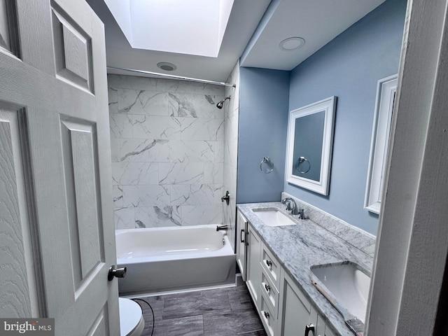 507 N Loudon Ave, Baltimore, MD 21229 - full bath with double vanity,  shower combination, and a skylight