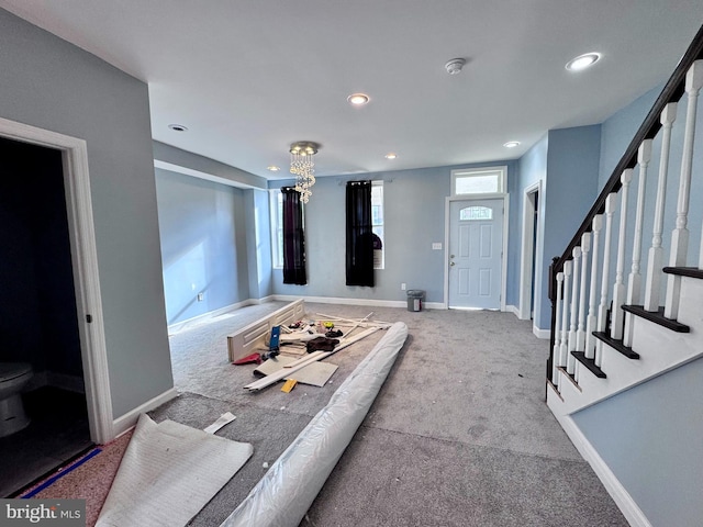 507 N Loudon Ave, Baltimore, MD 21229 - carpeted living area with stairs and recessed lighting