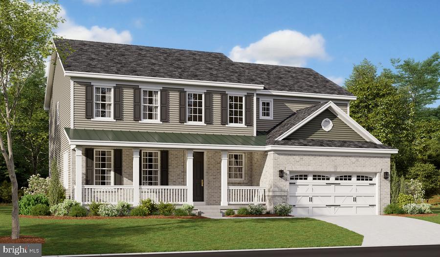 view of front of house with a front lawn, covered porch, brick siding, and concrete driveway