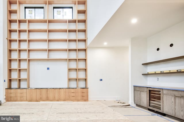 913 Drexel Ln, Bryn Mawr, PA 19010 - bar with wine cooler, recessed lighting, and baseboards