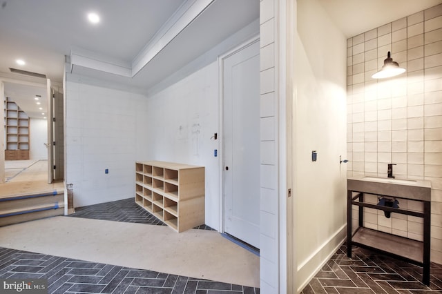 913 Drexel Ln, Bryn Mawr, PA 19010 - bathroom with recessed lighting, a sink, and ornamental molding
