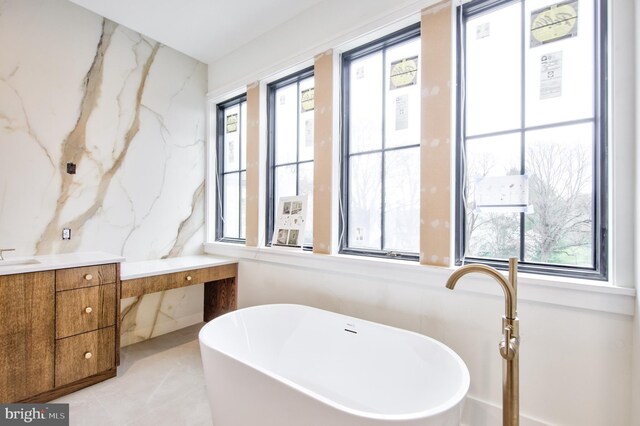 913 Drexel Ln, Bryn Mawr, PA 19010 - bathroom with a freestanding tub and vanity