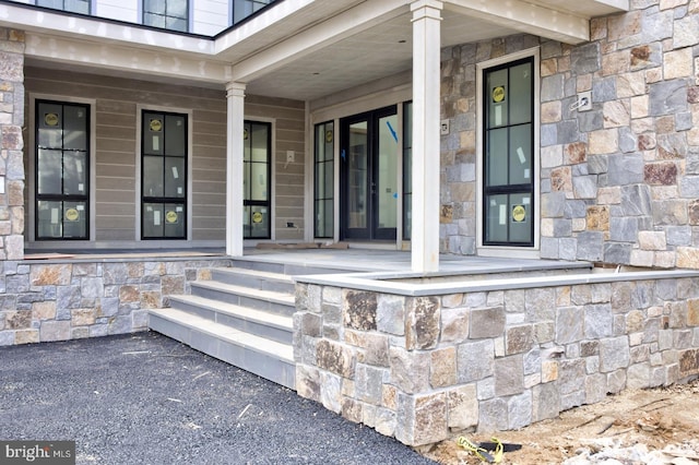 913 Drexel Ln, Bryn Mawr, PA 19010 - entrance to property with covered porch and stone siding