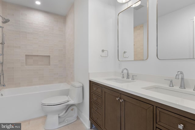 913 Drexel Ln, Bryn Mawr, PA 19010 - bathroom with toilet, double vanity, tile patterned floors,  shower combination, and recessed lighting